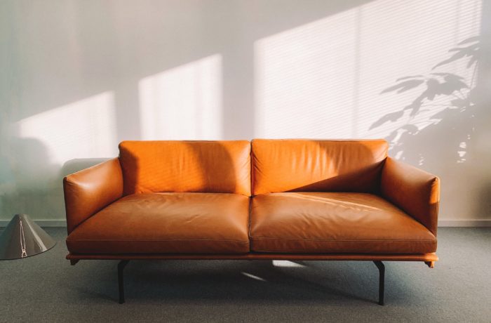 brown leather 2-seat sofa
