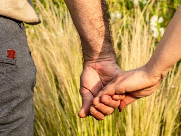 person holding hands