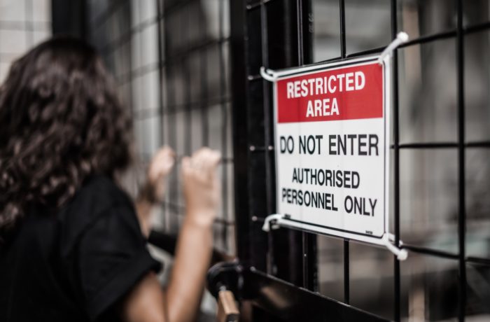 Restricted Area sign at the cyclone fence