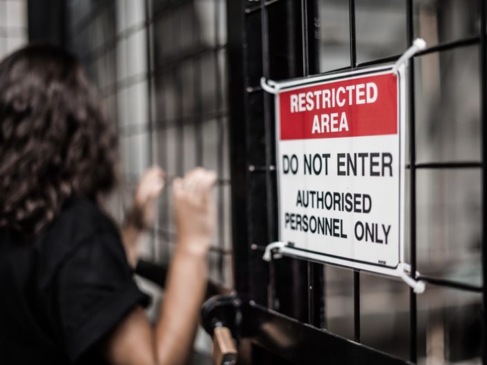 Restricted Area sign at the cyclone fence