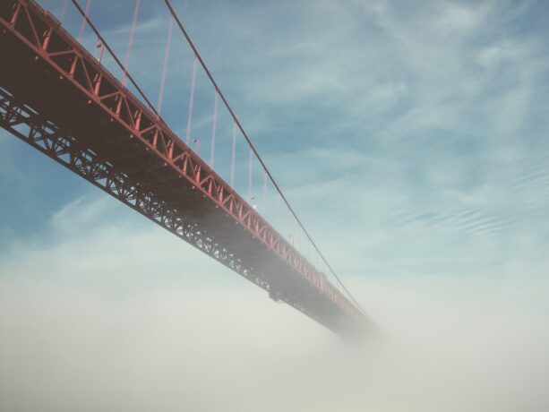photography of red crane bridge