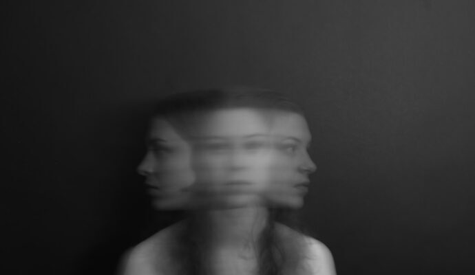 a blurry photo of a woman's face